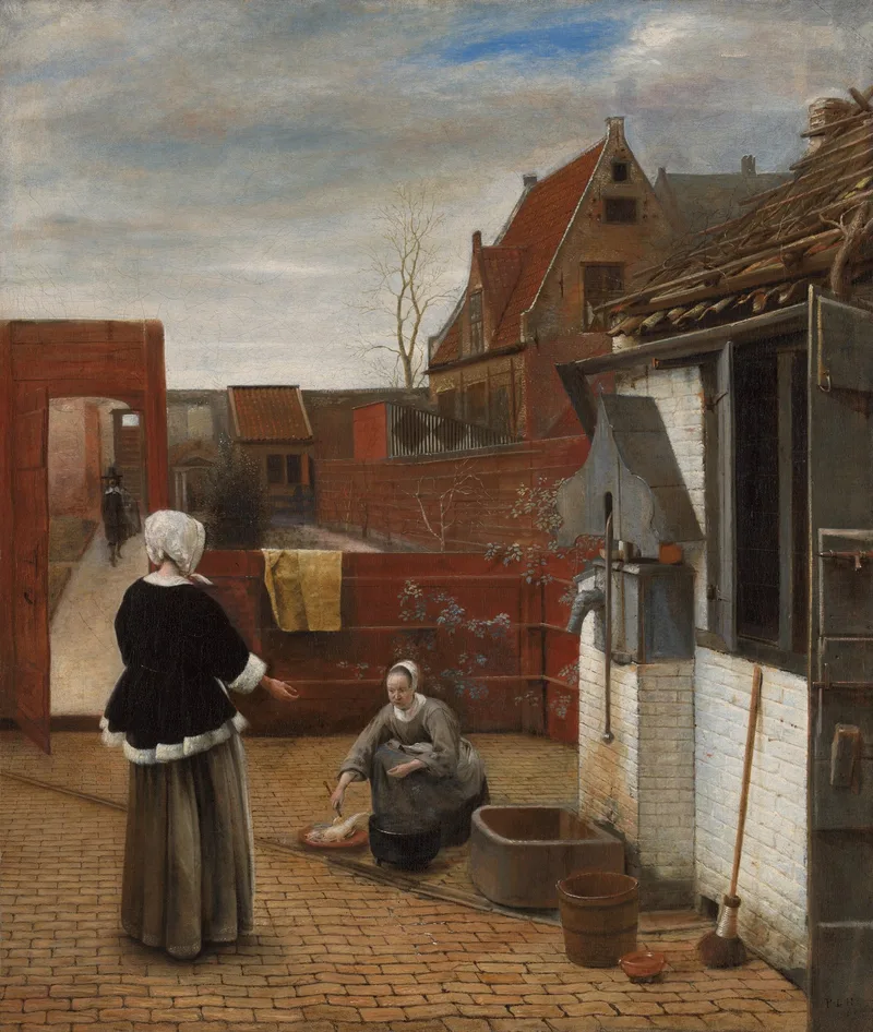 Two women talking in a sunlit brick courtyard, one standing and one kneeling at her work